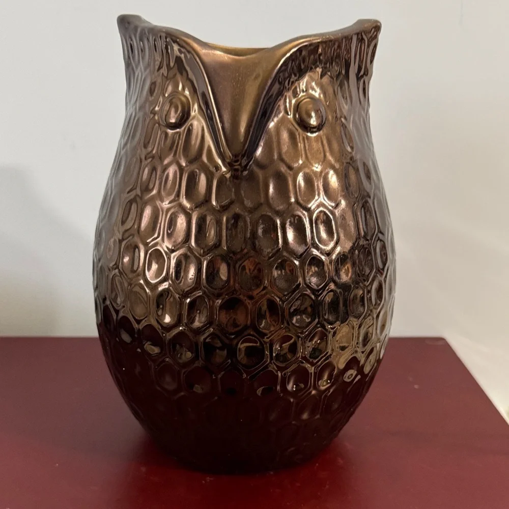 Copper/Bronze colored ceramic owl vase with a dimpled, metallic finish